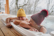 © Halfpoint - Senior couple bathing in hot tub during cold winter day. Romantic wellness getaway with spa during Valentine's weekend.