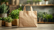 © Sabana - Brown paper bag surrounded by fresh herbs and greens in a cozy indoor setting