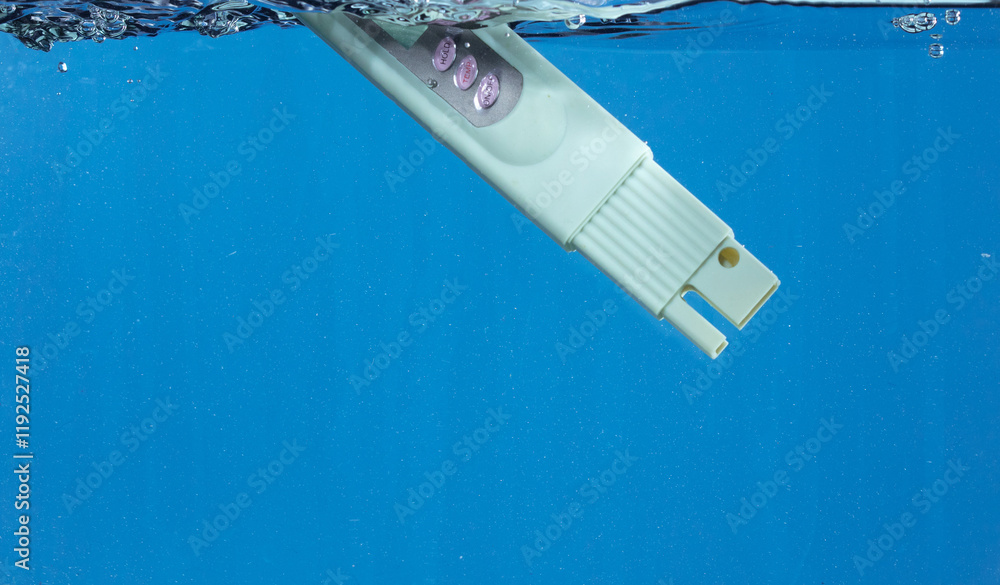 PH acid level test Device tools on quality water on screen. PH acid ...