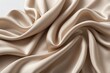 © jejakaryastudio - Draped beige silk fabric with soft folds and wrinkles, luxurious texture.