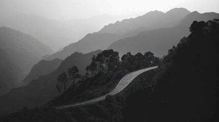 Sticker - Winding mountain road through scenic landscape.