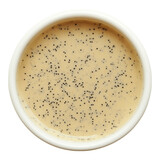 Poppy seed dressing isolated on a white background.