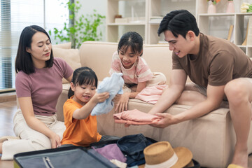 Young Asian family at home