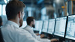 © forenna - Nuclear Power Plant Control Room with Engineers Monitoring Equipment