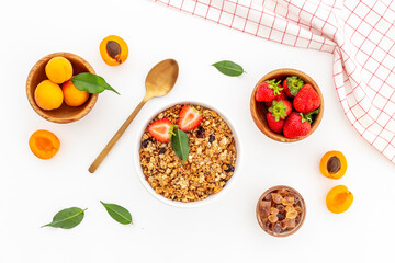 Wall Mural - Breakfast with cereal granola honey and strawberry, top view