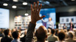 © Horizon Stock - Attendee Asking Question at Conference
