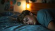 © sambath - A young person sleeping deeply with a relaxed expression in a tranquil bedroom.