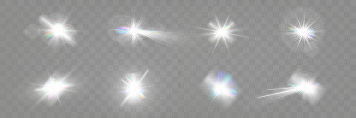Wall Mural - set of glowing light effects with starbursts and radiating beams on a transparent background, ideal 