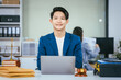 © NanSan - A male lawyer works diligently at his desk in a law office and courtroom, reviewing documents. He provides online legal consultations, assists businesses, and ensures justice through professional