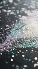 Poster - Sparkling iridescent pastel sparkles of lilac and mint green on a dark surface create a mesmerizing visual effect