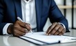 © Resni AI - Businessman signing contract at office desk