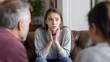 © Lalida - Teen Girl Expressing Worry During a Serious Problem Discussion with Parents.