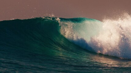 Wall Mural - Ocean wave rolls and breaks in the Maldives