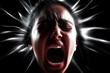 © smth.design - Intense portrait of an Asian young woman expressing extreme emotion in a dark setting