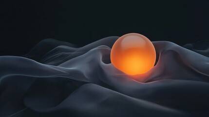 Poster - A glowing orange ball is on a black background