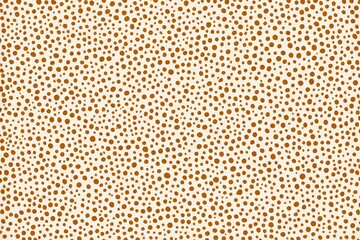 a close up of a white and orange dotted background
