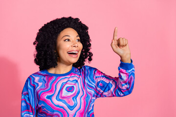 Photo of pretty lovely woman wear trendy print clothes arm touch empty space isolated on pink color background