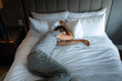 © kieferpix - Stressed exhausted young man lying in bed