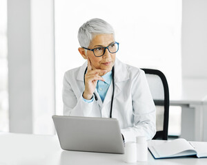 Wall Mural - doctor senior laptop woman medical hospital care health clinic elderly mature caucasian female happy healthcare glasses office confident medicine occupation