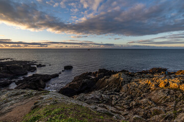 Wall Mural - France, Brittany, Plougonvelin. Atlantic Ocean near the ruins of the Abbey of Saint Mathieu and the Saint Mathieu Lighthouse