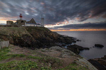 Wall Mural - France, Brittany, Plougonvelin. Ruins of the Abbey of Saint Mathieu and the Saint Mathieu Lighthouse