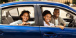 © Prostock-studio - Happy Black Family In New Blue Car Posing Smiling To Camera Having Ride In City. Parents And Preteen Daughter Sitting In Luxury Auto. Automobile Ownership And Purchase Concept. Selective Focus