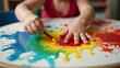 © Adrianna - Young child enjoys painting at a daycare facility, fun activity to teach creativity