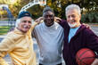 © Marko Geber - Portrait of diverse senior men on outdoor basketball court