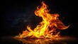 © Indigo Studio - Intense, vibrant flames dance against a dark backdrop, their heat reflected in the surface below.  The fire burns brightly, casting a warm glow on the surrounding darkness.