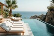 © kardaska - Infinity pool overlooking mediterranean sea at luxury resort in spain