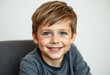 © iushakovsky - A portrait of a happy 7-year-old boy with a gentle smile