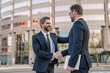 © be free - Partnership concept. Handshaking. Business partnership. Business deal. Businessmen handshaking after contract deal. Successful agreement in business deal. Businessmen dealing. Business support