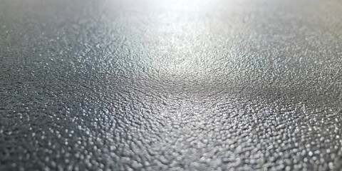 Aufkleber - Close-up Texture of a Shiny, Slightly Rough Surface with Subtle Light Reflections