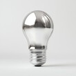 © Fitri - Shiny chrome lightbulb on white background.