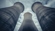 © Thanawat_Suesoypan - Industrial cooling towers against a moody sky