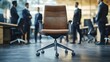 © Farid - Modern Office Chair Awaits Employees In Busy Workplace