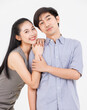© Bangkok Click Studio - Portrait of young asian happy attractive cheerful couple love, Joyful sweethearts embracing cuddle enjoy good time romantic date, posing to camera smiling together on white background Valentine's Day