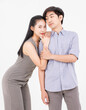 © Bangkok Click Studio - Portrait of young asian happy attractive cheerful couple love, Joyful sweethearts embracing cuddle enjoy good time romantic date, posing to camera smiling together on white background Valentine's Day