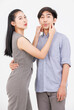 © Bangkok Click Studio - Portrait of young asian happy attractive cheerful couple love, Joyful sweethearts hugging embracing cuddle enjoy good time romantic date, posing to camera smiling standing together on white background