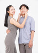 © Bangkok Click Studio - Portrait of young asian happy attractive cheerful couple love, Joyful sweethearts hugging embracing cuddle enjoy good time romantic date, posing to camera smiling standing together on white background