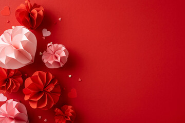 Wall Mural - Elegant paper flowers with small hearts on a rich red background, perfect for Valentine's Day celebration. Captures the essence of love and romance with a minimalist design