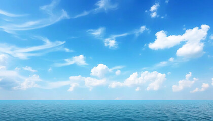 Wall Mural - A serene view of the blue ocean and the cloud - dotted sky, natural colors,
