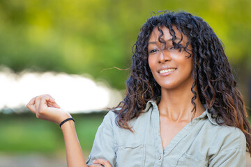 portrait of young latina girl or woman outdoors