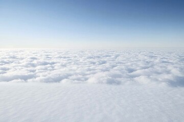 Wall Mural - aerial view of clouds from an airplane window