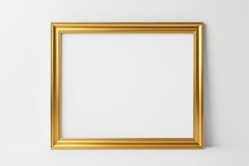 a close up of a gold frame on a white wall