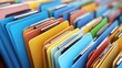 © Planetz - Colorful file folders organized in rows for efficient document management and online documentation system use in modern office environment