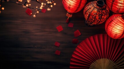 Wall Mural - A traditional Chinese New Year background with glowing red lanterns, hand-held fans placed alongside them, and scattered red envelopes.