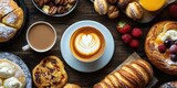 Delicious breakfast spread with coffee cup in center surrounded by pastries nuts and berries on rustic wooden table in warm tones