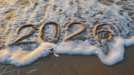 Wall Mural - Sand numbers 2020 on beach with ocean waves gently washing over them, creating serene and reflective atmosphere. moment captured in time