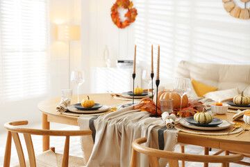 Poster - Stylish table setting with beautiful dishware and autumn decor in dining room